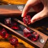 resin-dice-heartspark-set-7-ebony-dice-vault-action
